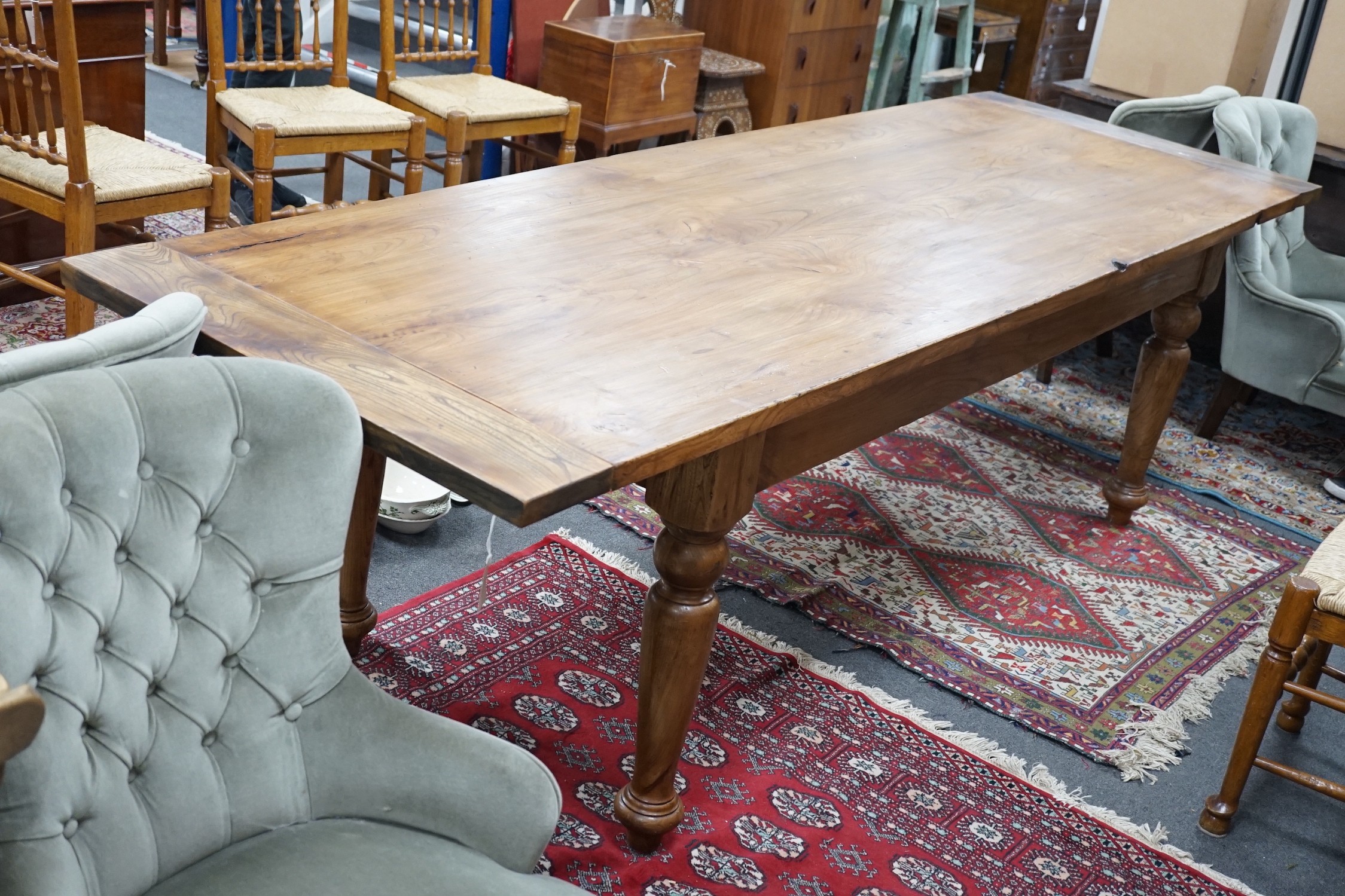 A Victorian style rectangular elm farmhouse table, length 272cm, depth 87cm, height 78cm